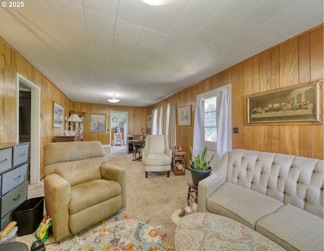 33855 NE Blossom Dr, Scappoose, OR 97056 - living room featuring wood walls and carpet flooring