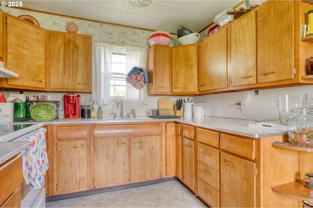 33855 NE Blossom Dr, Scappoose, OR 97056 - kitchen with white electric range oven, light countertops, a sink, and wallpapered walls