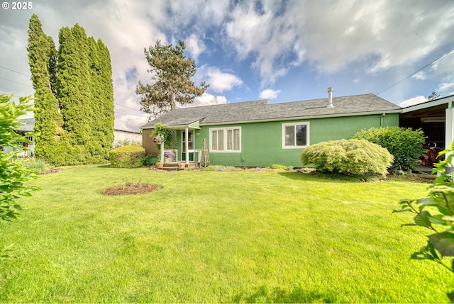 33855 NE Blossom Dr, Scappoose, OR 97056 - rear view of property with a lawn