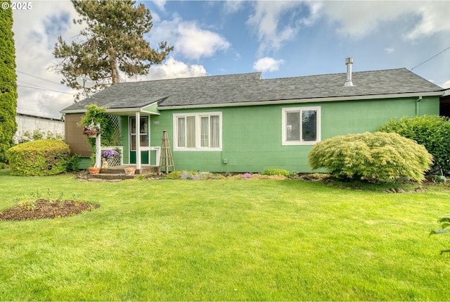 33855 NE Blossom Dr, Scappoose, OR 97056 - back of house with a yard, concrete block siding, and roof with shingles