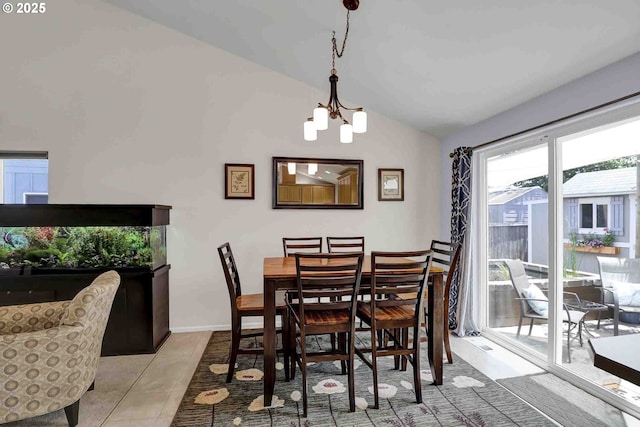 5986 Rombauer Rd, Eugene, OR 97402 - dining area with lofted ceiling, a chandelier, and light tile patterned flooring