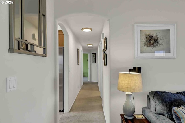 5986 Rombauer Rd, Eugene, OR 97402 - corridor featuring arched walkways and light colored carpet