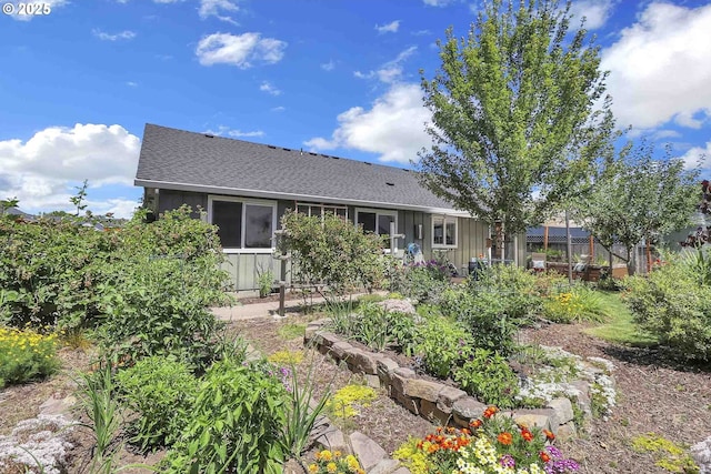 5986 Rombauer Rd, Eugene, OR 97402 - rear view of house with board and batten siding and roof with shingles