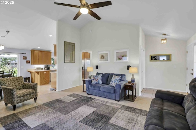 5986 Rombauer Rd, Eugene, OR 97402 - living area with arched walkways, a ceiling fan, lofted ceiling, and recessed lighting