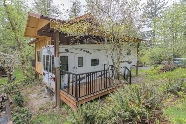 24706 NE Columbia Tie Rd Unit 41/21, Amboy, WA 98601 - rear view of house with a wooden deck