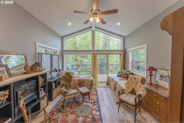 24706 NE Columbia Tie Rd Unit 41/21, Amboy, WA 98601 - living room with vaulted ceiling, a ceiling fan, light wood finished floors, and a healthy amount of sunlight