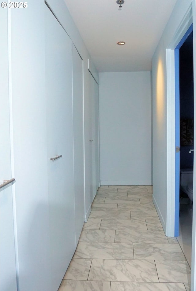 1260 NW Naito Pkwy Unit 604B, Portland, OR 97209 - hallway featuring recessed lighting and marble finish floor