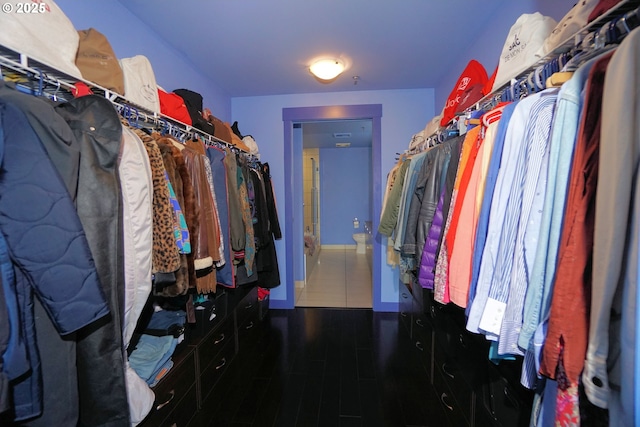 1260 NW Naito Pkwy Unit 604B, Portland, OR 97209 - walk in closet featuring wood finished floors