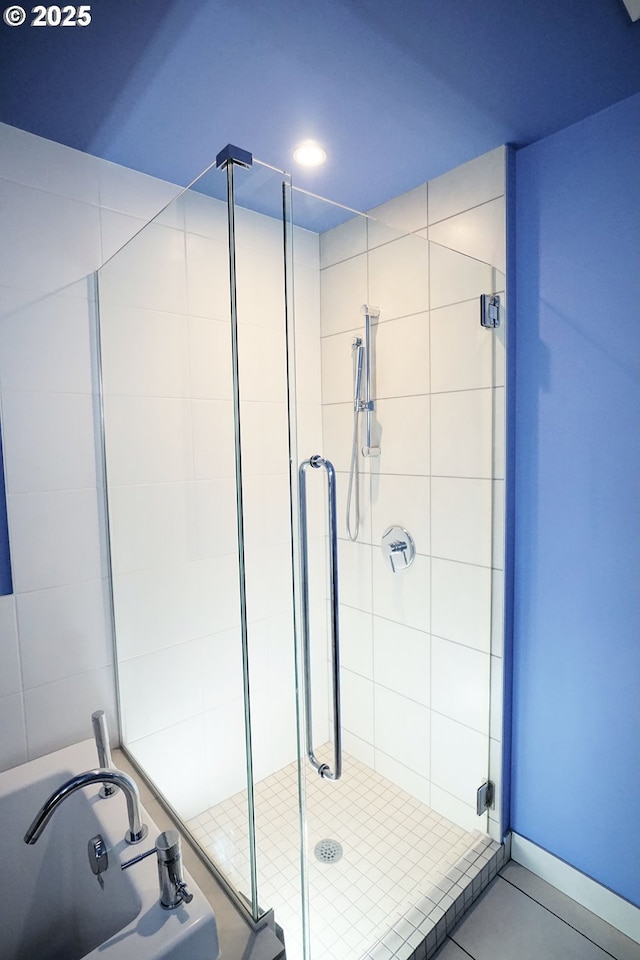 1260 NW Naito Pkwy Unit 604B, Portland, OR 97209 - full bathroom with recessed lighting, tile patterned flooring, a shower stall, and a bath