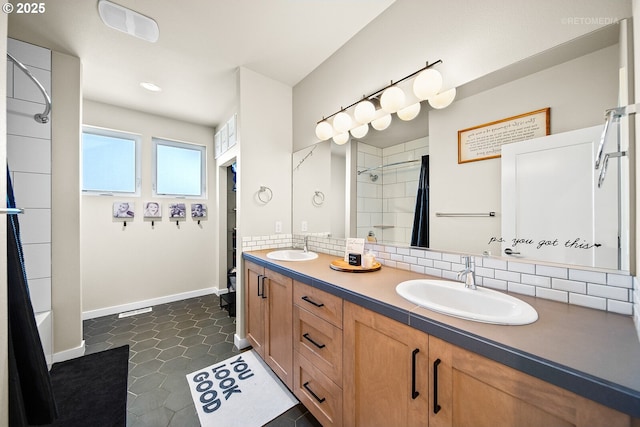 bathroom with backsplash, shower / bath combination with curtain, tile patterned floors, and vanity