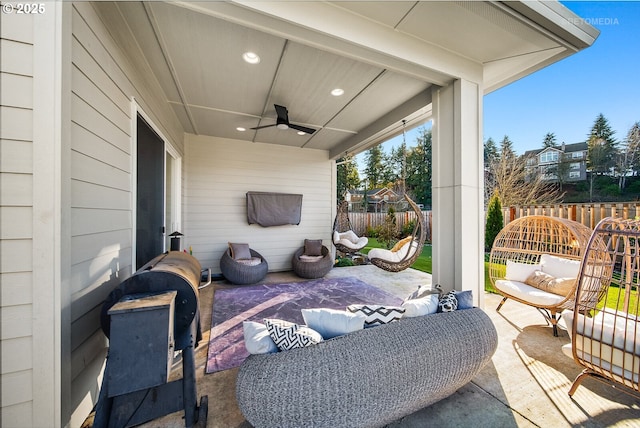 view of patio featuring an outdoor hangout area and ceiling fan