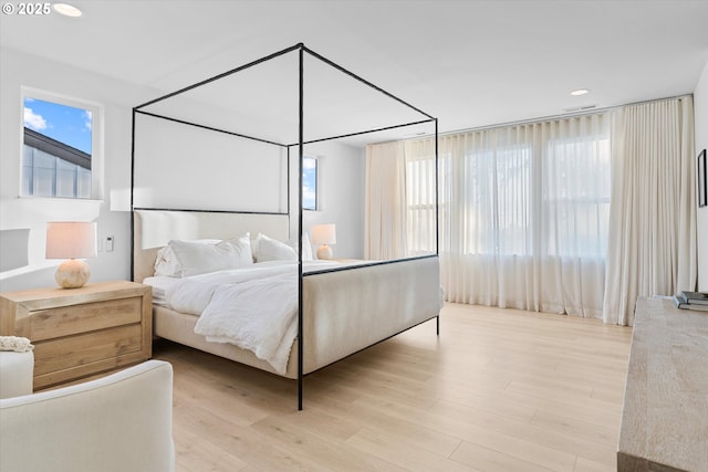 bedroom featuring light wood-type flooring