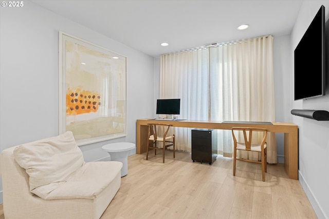 office area featuring light hardwood / wood-style flooring