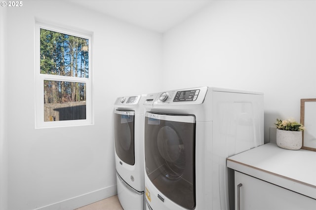 washroom with separate washer and dryer