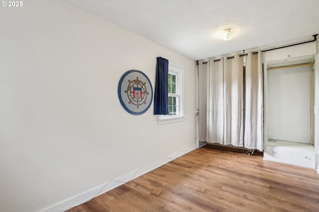 545 N St, Castle Rock, WA 98611 - unfurnished bedroom featuring wood finished floors and baseboards