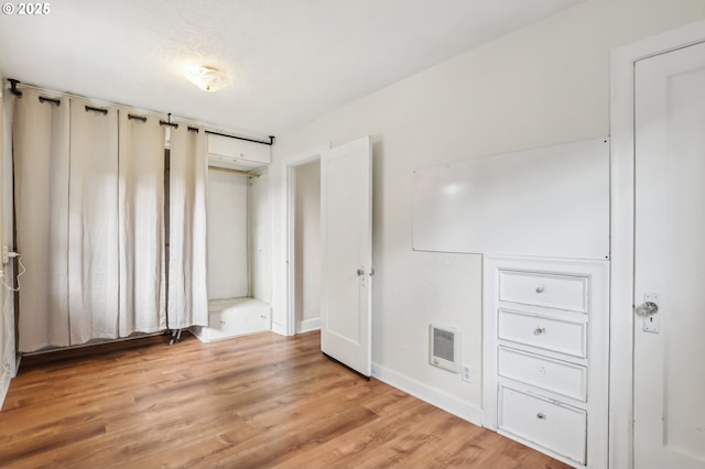 545 N St, Castle Rock, WA 98611 - unfurnished bedroom featuring light wood-type flooring and baseboards