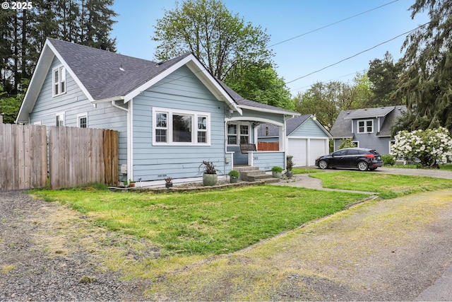 545 N St, Castle Rock, WA 98611 - bungalow-style house with a shingled roof and a garage