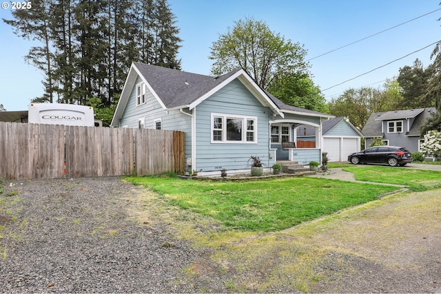545 N St, Castle Rock, WA 98611 - bungalow-style home with a garage and a shingled roof