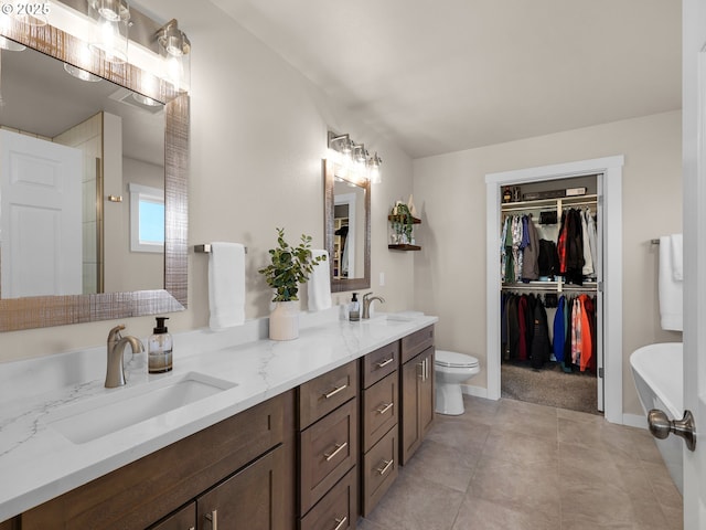 35692 Bella Ridge Loop, Astoria, OR 97103 - full bath with walk in shower, double vanity, a sink, and tile patterned floors