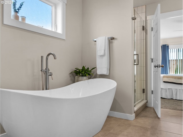 35692 Bella Ridge Loop, Astoria, OR 97103 - full bath featuring tile patterned flooring, a freestanding tub, a stall shower, and ensuite bathroom