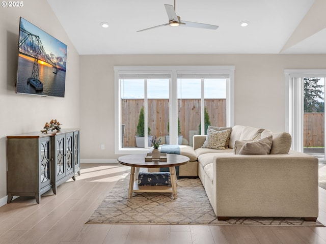 35692 Bella Ridge Loop, Astoria, OR 97103 - living room featuring baseboards, wood finished floors, recessed lighting, a ceiling fan, and lofted ceiling
