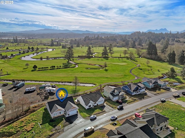 35692 Bella Ridge Loop, Astoria, OR 97103 - birds eye view of property featuring view of golf course and a mountain view