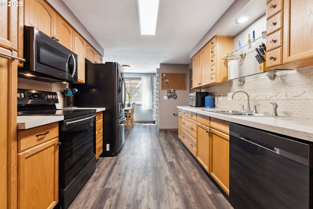 8312 SW Tygh Loop, Tualatin, OR 97062 - kitchen featuring dishwasher, black electric range, a sink, dark wood-style floors, and backsplash