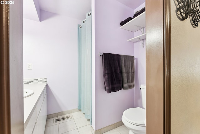 8312 SW Tygh Loop, Tualatin, OR 97062 - full bath with vanity, tile patterned flooring, toilet, and a shower