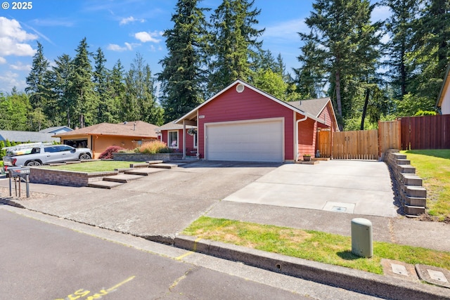 8312 SW Tygh Loop, Tualatin, OR 97062 - ranch-style house featuring a garage and driveway