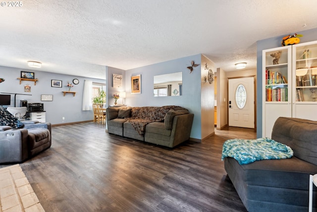 8312 SW Tygh Loop, Tualatin, OR 97062 - living room featuring a textured ceiling, wood finished floors, healthy amount of natural light, and baseboards