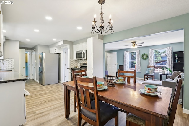 284 N 17th St, Saint Helens, OR 97051 - dining room with light wood-style floors, recessed lighting, a ceiling fan, and a chandelier