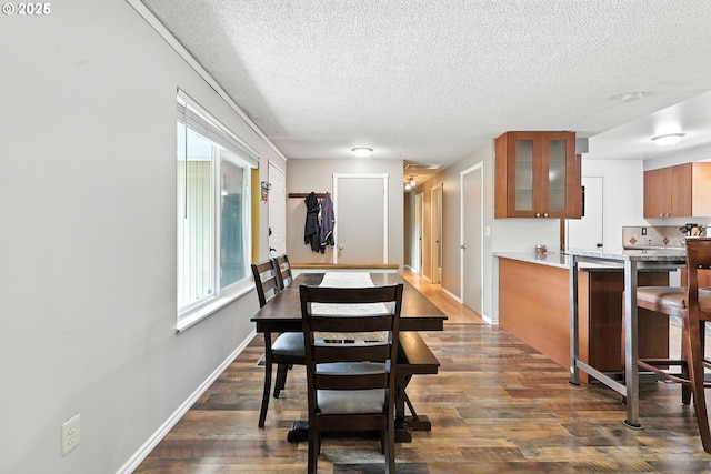 1481 SW 5th Pl, Gresham, OR 97080 - dining space with a textured ceiling and dark wood-type flooring