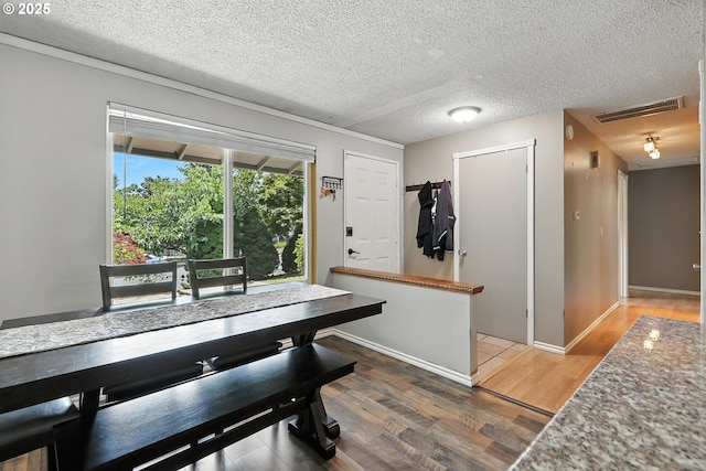 1481 SW 5th Pl, Gresham, OR 97080 - dining area with wood finished floors and a textured ceiling