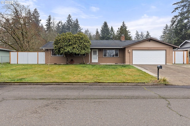 ranch-style home with a front yard and a garage