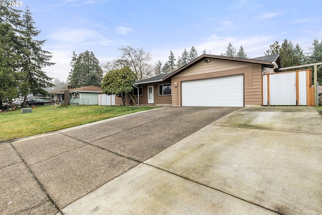 ranch-style house with a front lawn and a garage