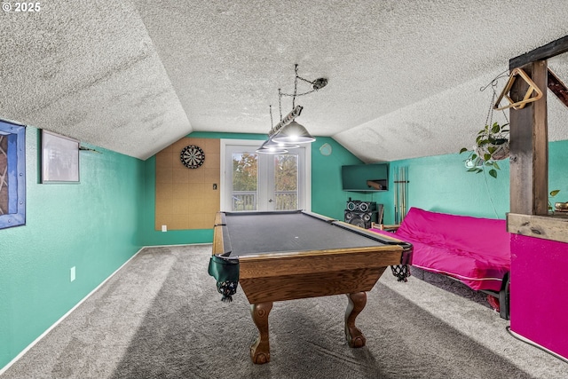 playroom featuring billiards, carpet flooring, vaulted ceiling, and a textured ceiling