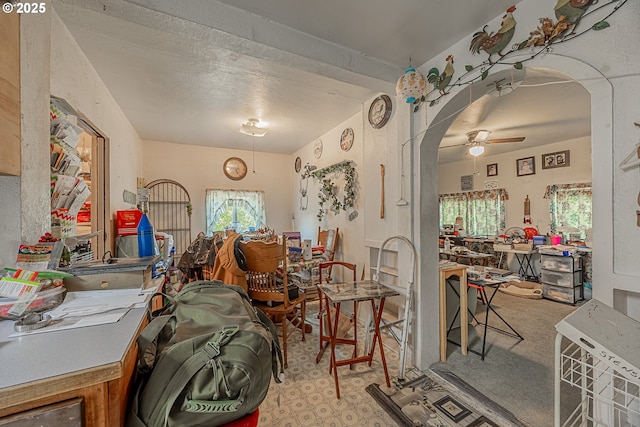 1446 N Collier St, Coquille, OR 97423 - dining space with arched walkways and a ceiling fan