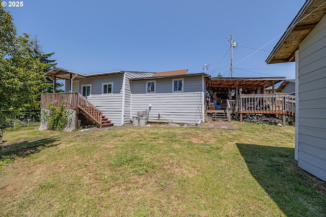 1446 N Collier St, Coquille, OR 97423 - back of property with a wooden deck, a yard, and stairway