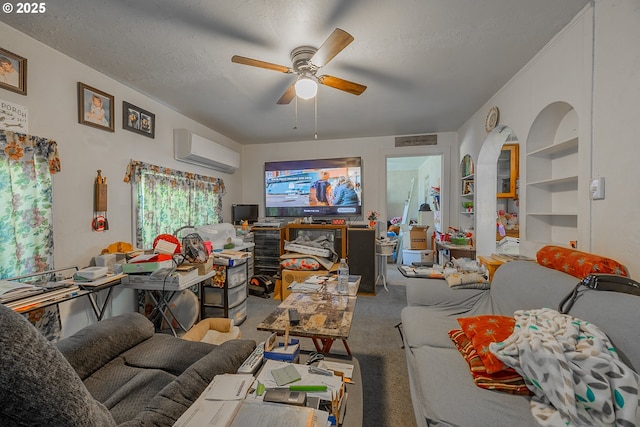 1446 N Collier St, Coquille, OR 97423 - living room featuring an AC wall unit, ceiling fan, carpet, built in features, and a textured ceiling