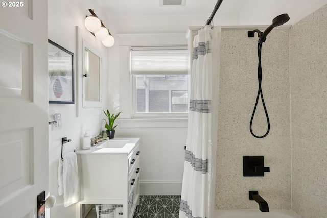 bathroom with vanity and shower / tub combo