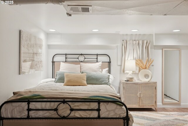 bedroom featuring hardwood / wood-style flooring