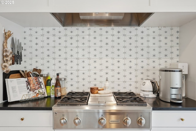 kitchen featuring white cabinetry, decorative backsplash, exhaust hood, and stainless steel gas stovetop