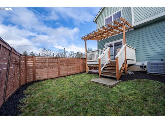 view of yard with a fenced backyard, central AC unit, a deck, and a pergola