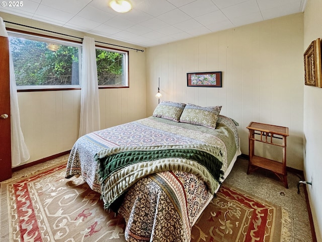 carpeted bedroom with baseboards
