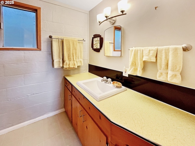 bathroom featuring tile patterned floors and vanity