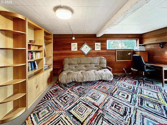 living area featuring wooden walls