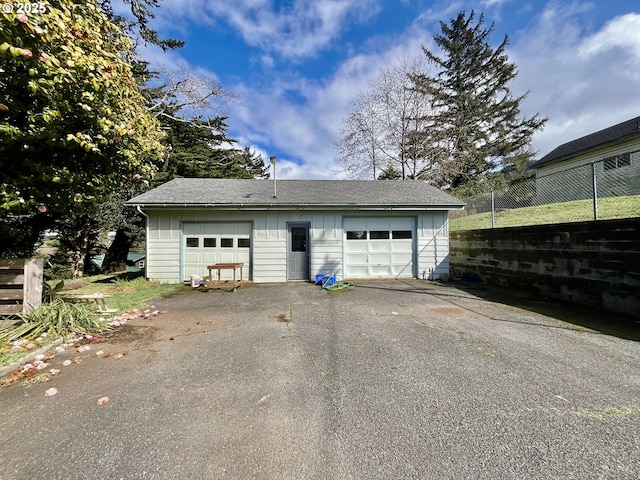 detached garage with fence