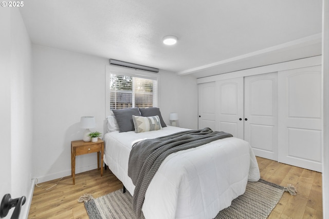 10095 SW 82nd Ave, Portland, OR 97223 - bedroom with light wood-style floors and a closet