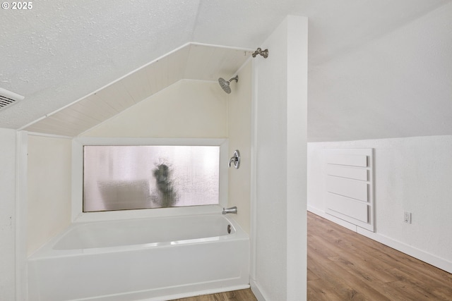 10095 SW 82nd Ave, Portland, OR 97223 - full bathroom with lofted ceiling, wood finished floors, a textured ceiling, and baseboards