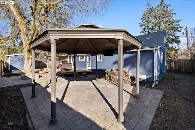 10095 SW 82nd Ave, Portland, OR 97223 - fenced backyard featuring a gazebo, a patio area, and a carport